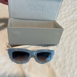 Dezi on Read sunglasses